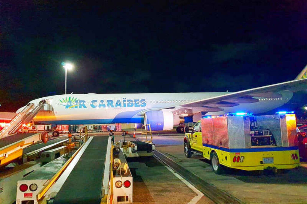 An Air Caraibes A330-300 suffered an engine problem, with noises and flashes being reported, during departure from SXM.