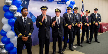 United's pilots picket in anticipation of the peak summer travel season for higher pay.