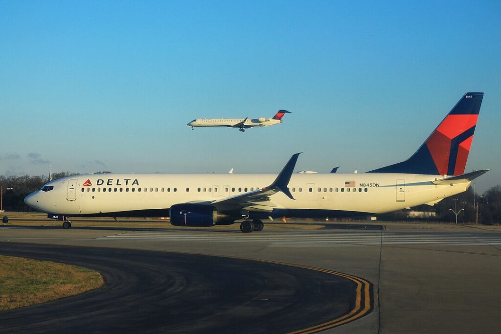 a Boeing 737 operated by Delta Air Lines (DL) collided with a stairs truck while taxiing away from its parking position at George Town (GCM) in the Cayman Islands.