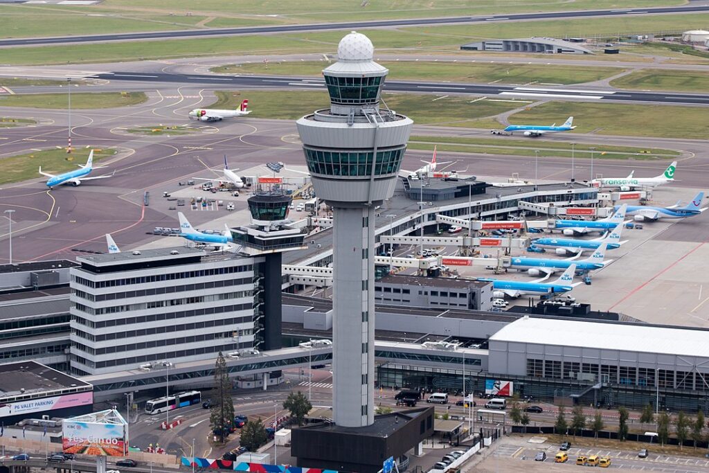Legal action is set as some airlines prepare to challenge a recent judgment on annual flight reductions from Amsterdam's Schiphol airport...