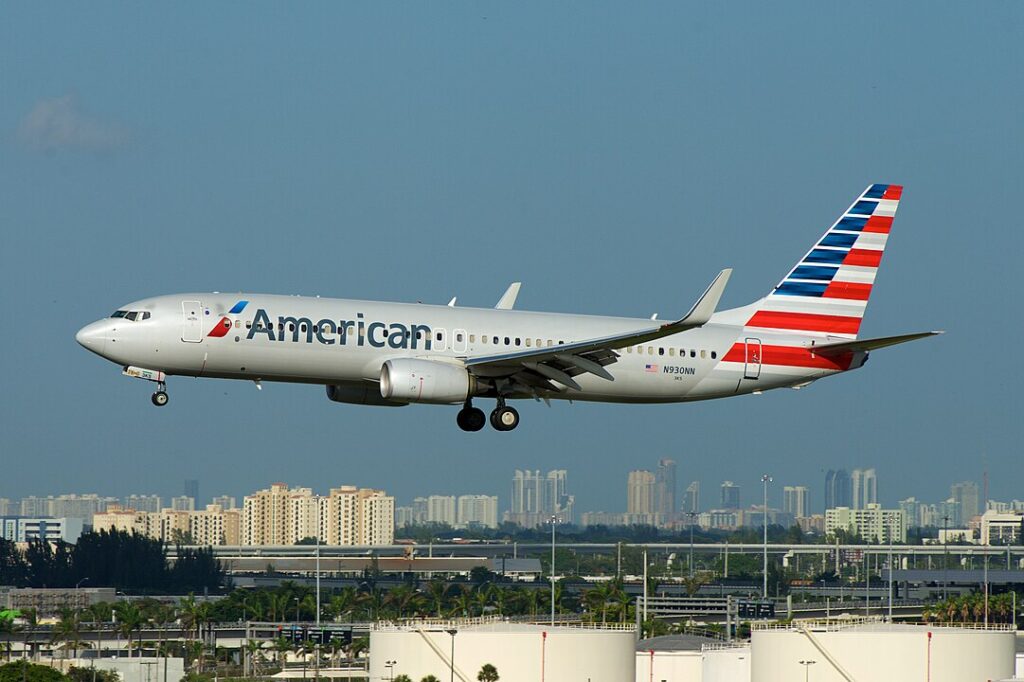 A passenger on an American Airlines (AA) flight from Texas to Montana, identified as Keith Edward Fagiana from Las Vegas, allegedly assaulted a flight attendant after being asked to stop kicking another passenger's seat. 