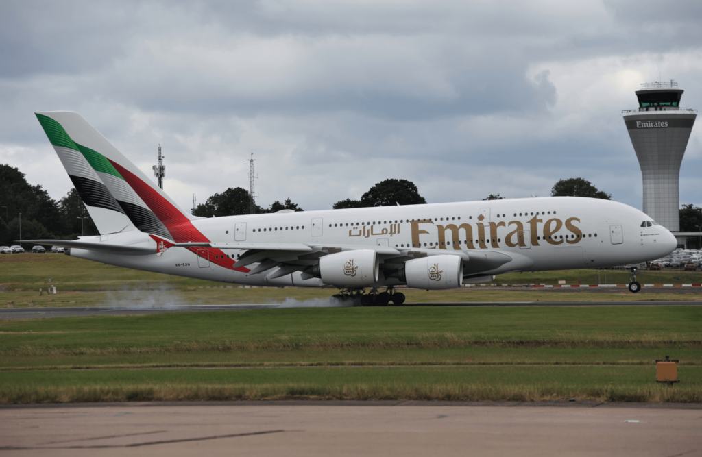 Emirates (EK) Airbus A380 at Birmingham Airport Receives Assistance from Emergency Services after Landing Incident.