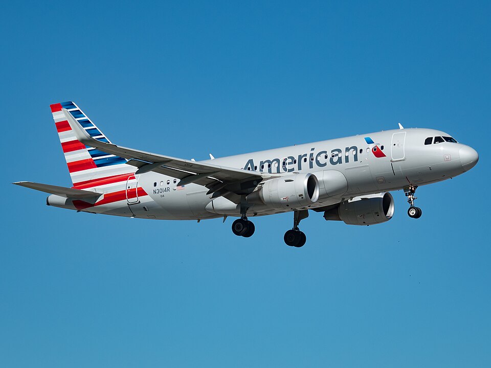 An incident occurred at Boston Airport where American Airlines A319, while being towed for parking, collided with an unoccupied pickup truck.