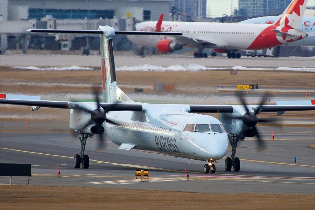 Two Air Canada (AC) flights had to be deactivated following a collision incident in which one aircraft wing clipped another while being pushed back from the gate.