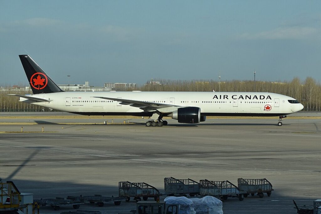 Passenger on Air Canada flight sustained injuries after falling amid opening door of Boeing 777, which was still at boarding gate at Toronto