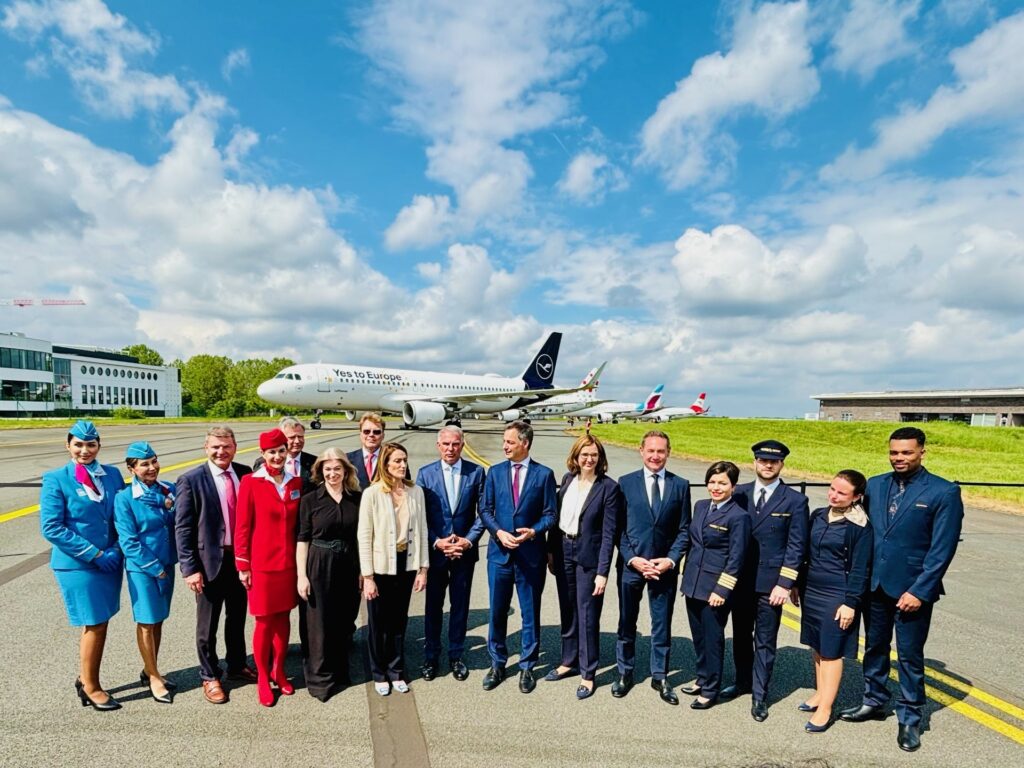 Four specially liveried Airbus A320s from Lufthansa Airlines (LH), Austrian Airlines (OS), Brussels Airlines (SN), and Eurowings (EW) convened simultaneously, adorned with the striking slogan 'Yes to Europe' and the emblem of the European circle of stars on their fuselage sides.