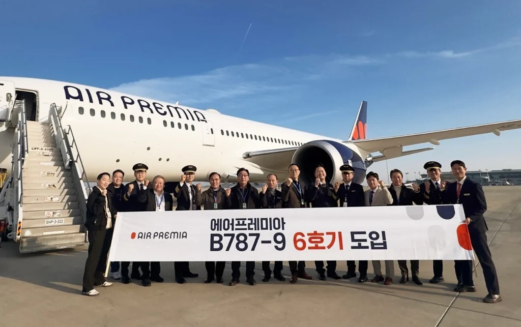 Air Premia CEO Kim Jae-hyun (seventh from left) and executives celebrate the arrival of the airline's sixth Boeing 787-9 aircraft during a special ceremony at Incheon International Airport