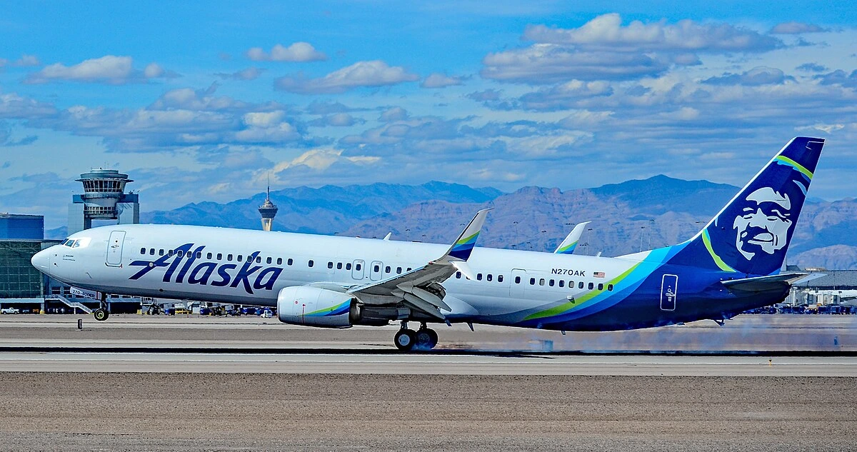 Alaska Airlines Passenger Tries to Open 737 Door, Faces $250K Fine and 20 Years in Jail