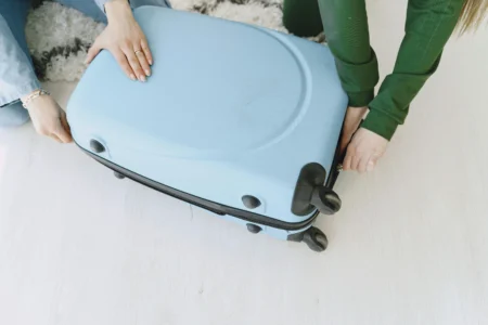 Flight Attendant Reveals £4.38 Suitcase Hack That Prevents Airport Dirt