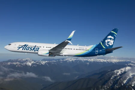 Alaska Airlines Passenger Tries to Open 737 Door, Faces $250K Fine and 20 Years in Jail
