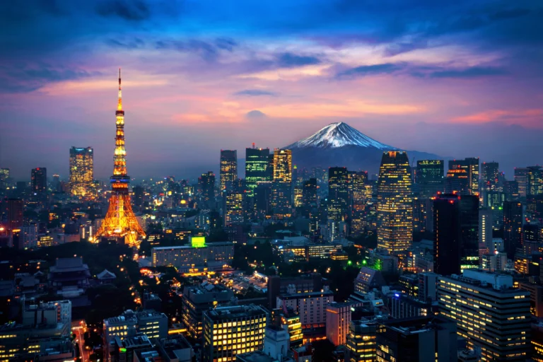 These are 10 Best Cities in the World for Nightlife, No.5 Will Surprise You!! Tokyo cityscape at night with Mount Fuji behind in Japan