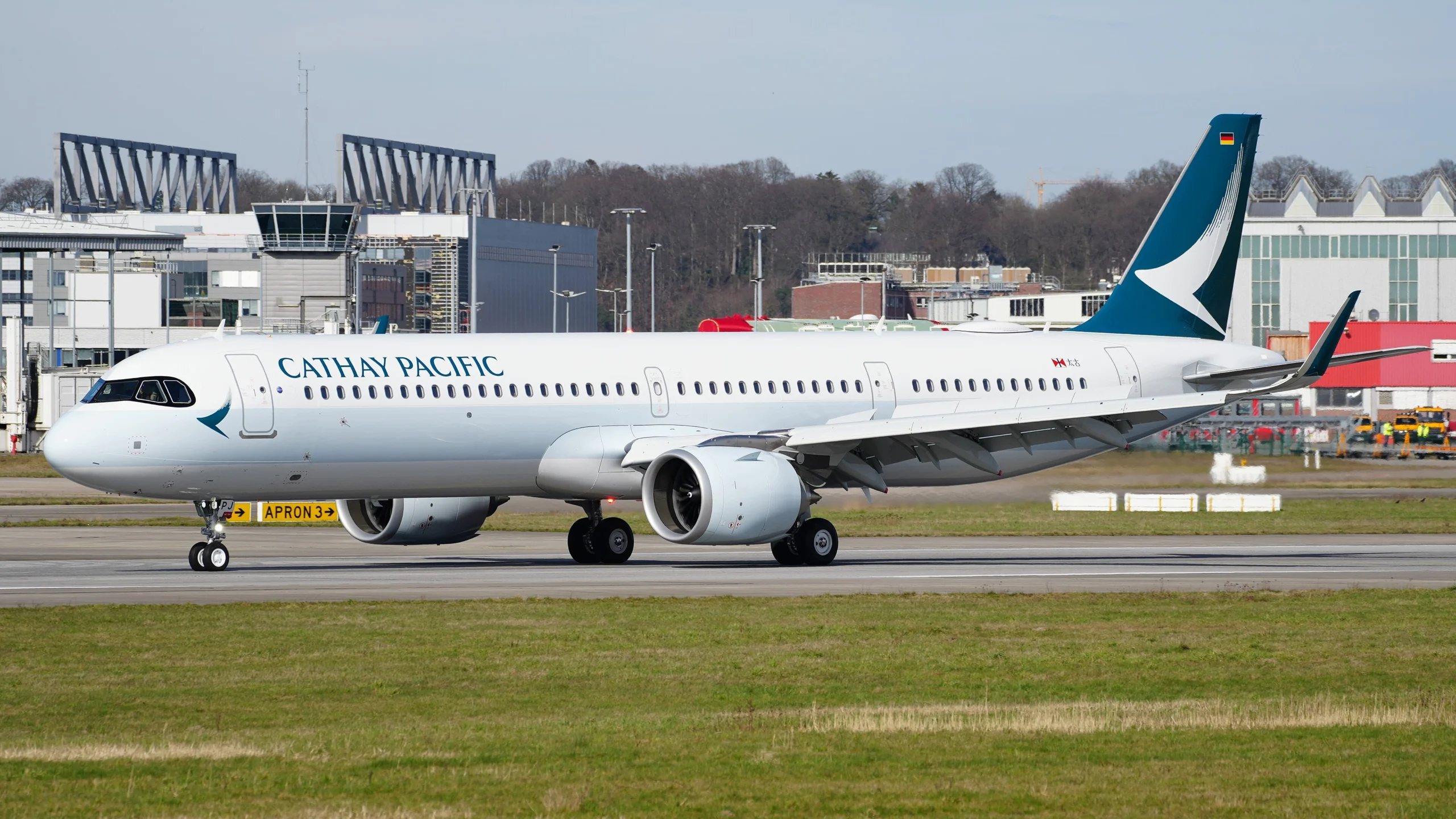 Cathay Pacific will redesign Airbus A321neo cabins with fewer seats, more legroom, and improved lavatories from 2026.