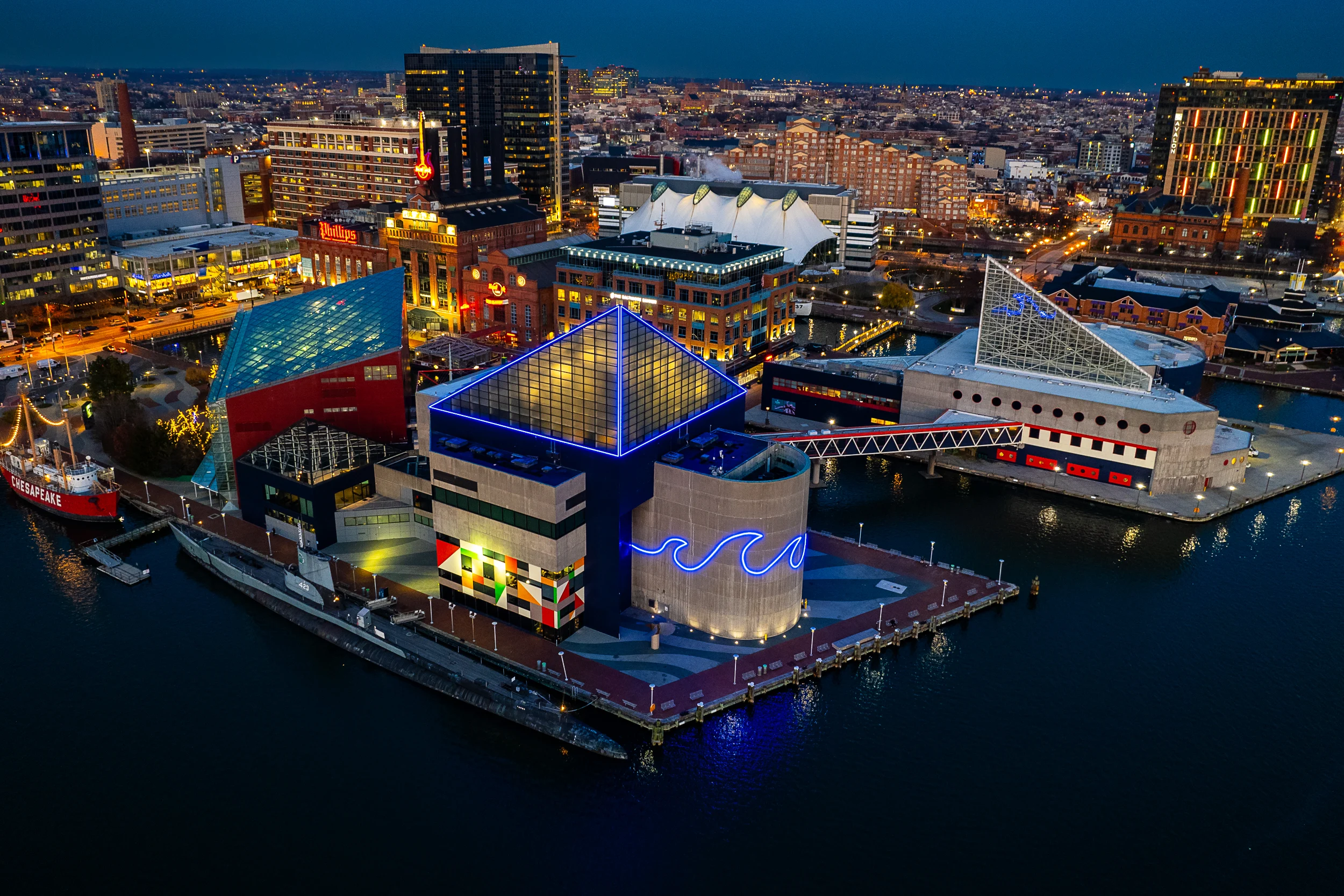 Aerial View of Baltimore National Museum At Night with panoramic city view