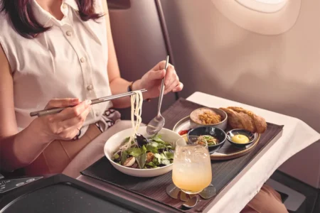 Is It Rude to Eat First on a Flight? Airline Etiquette Explained