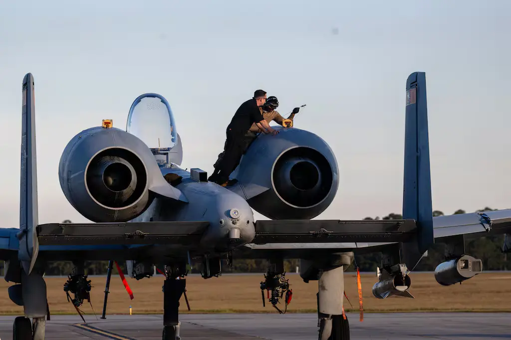 Airmen perform maintenance on an A-10C Thunderbolt II during exercise Mosaic Tiger 26-1 at Moody Air Force Base, Ga., Nov. 17, 2025. The exercise strengthens Agile Combat Employment capabilities by training maintainers to sustain aircraft operations with limited resources in contested environments.