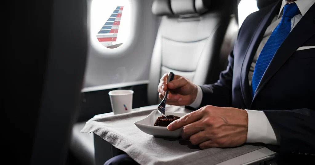 American Airlines Attendant Serves Passenger Fake Sparkling Wine Mixed in First Class
