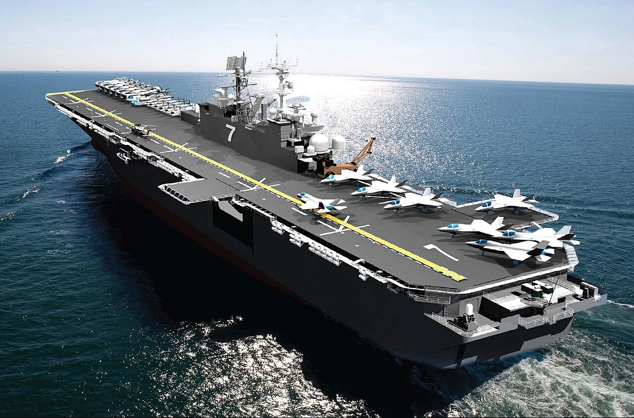 The United States is rapidly repositioning naval aviation assets toward the Middle East as tensions with Iran intersect with renewed diplomatic engagement.