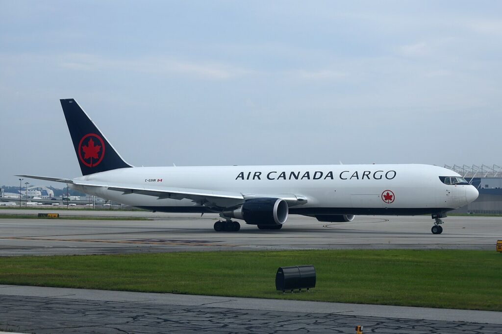 Air Canada Cargo Boeing 767 freighter at an airport ahead of an international cargo flight.